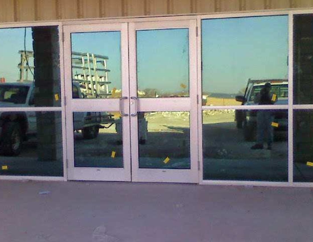Commercial double glass entrance door installation by Kent Glass in Colorado Springs