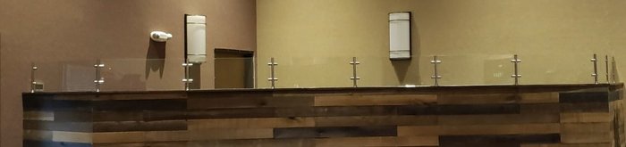 Interior commercial glass panel divider with stainless posts by Kent Glass
