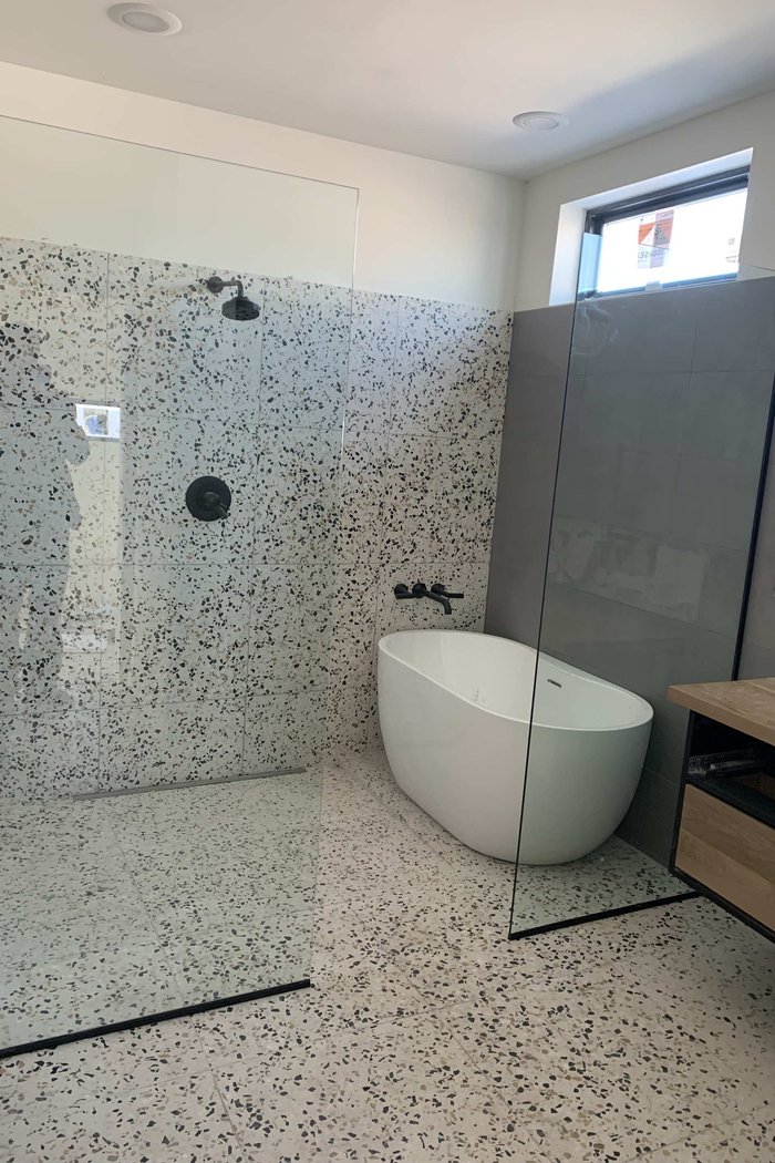 Custom frameless shower enclosure installed by Kent Glass, Colorado Springs
