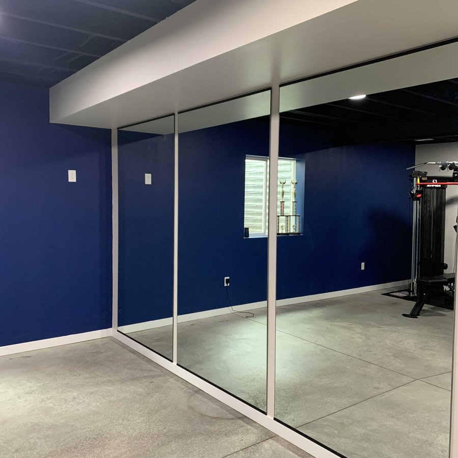 Custom wall-to-wall mirror installation by Kent Glass in Colorado Springs