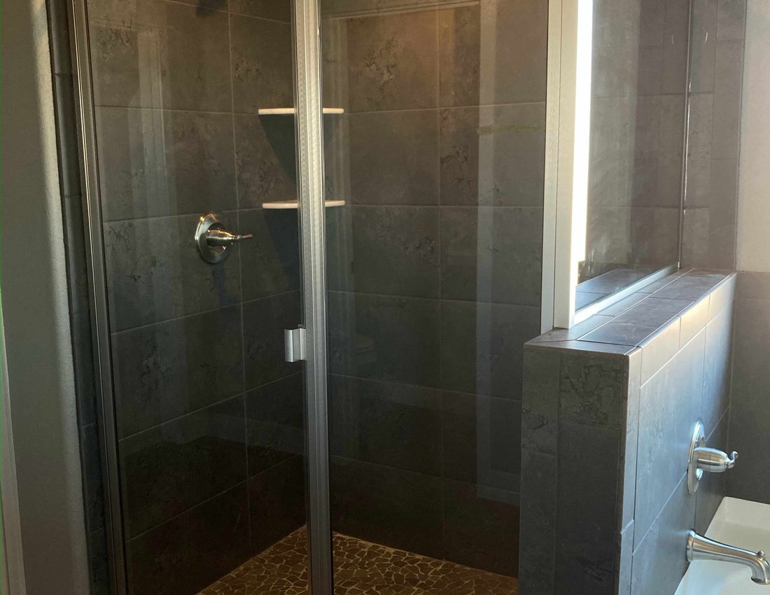 Semi-frameless shower enclosure installed by Kent Glass in Colorado Springs