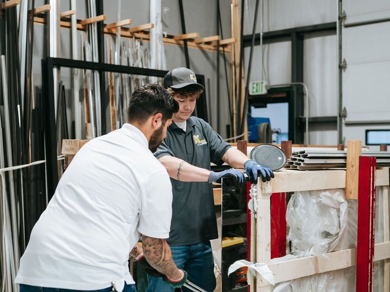 Kent Glass team moving glass through the fabrication shop